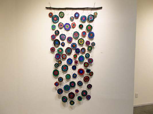 Sewing Circles 2 (2014). 80" x 42". Oil on canvas and wire.